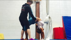 Back bend with split.  Assisted by  Shelly Guy! 